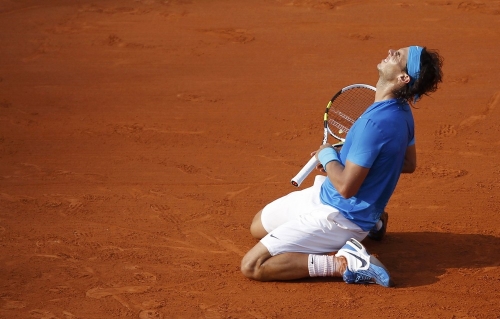 King of Clay, Nadal downs Federer to seal place in history