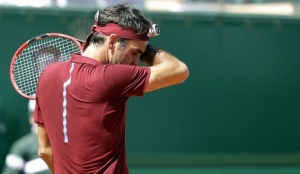 Roger Federer, citing back, knee injuries, withdraws from French Open